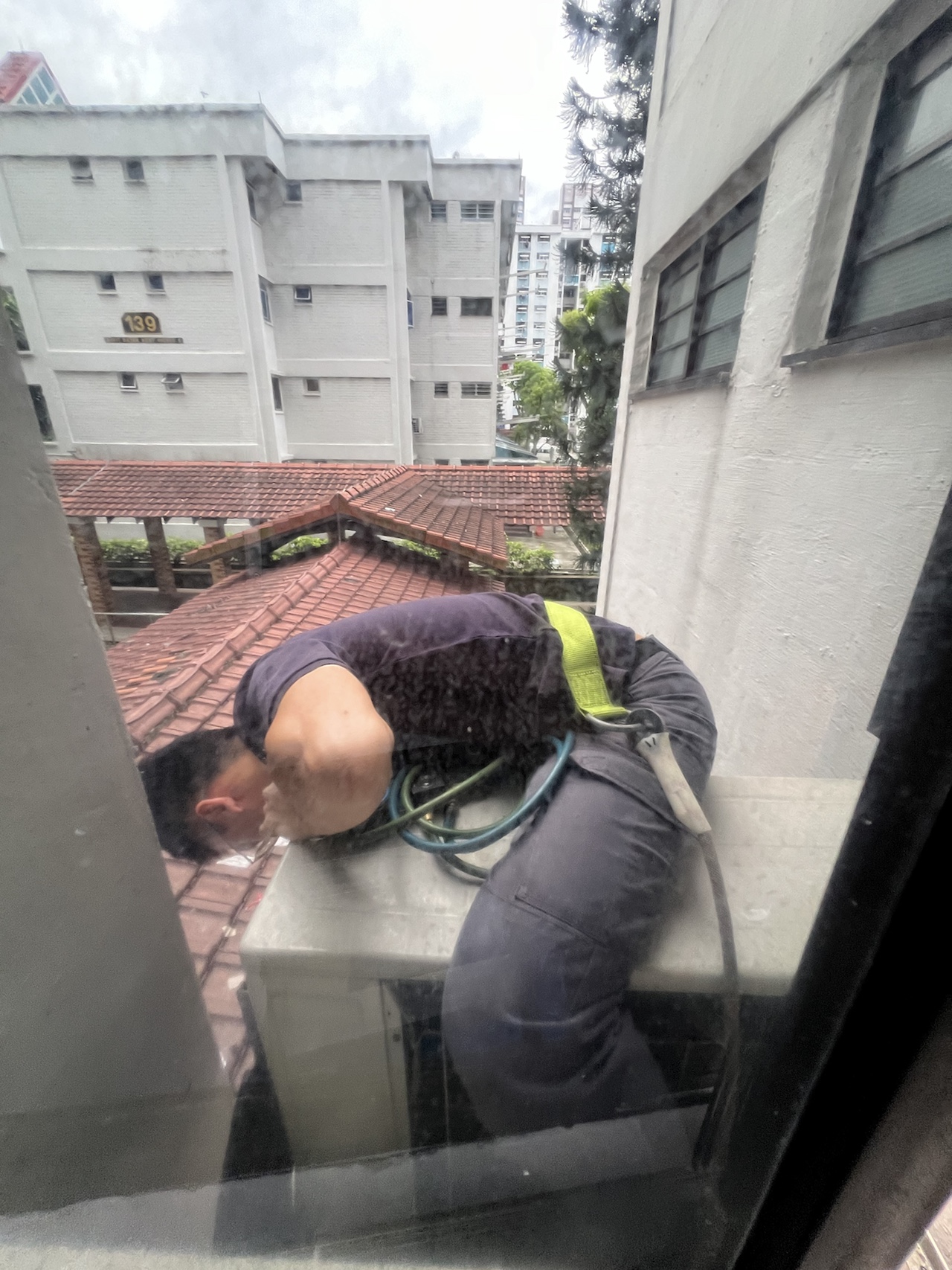 Aircon Technician at Work